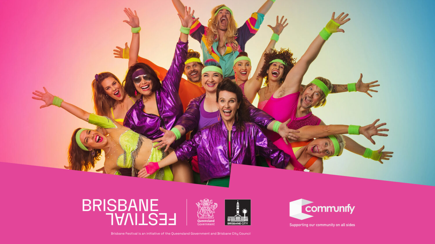 A vibrant group of diverse individuals celebrating at the Brisbane Festival, wearing colorful 1980s-inspired outfits in shades of pink, purple, and green. The group displays joyful expressions, with arms raised enthusiastically.